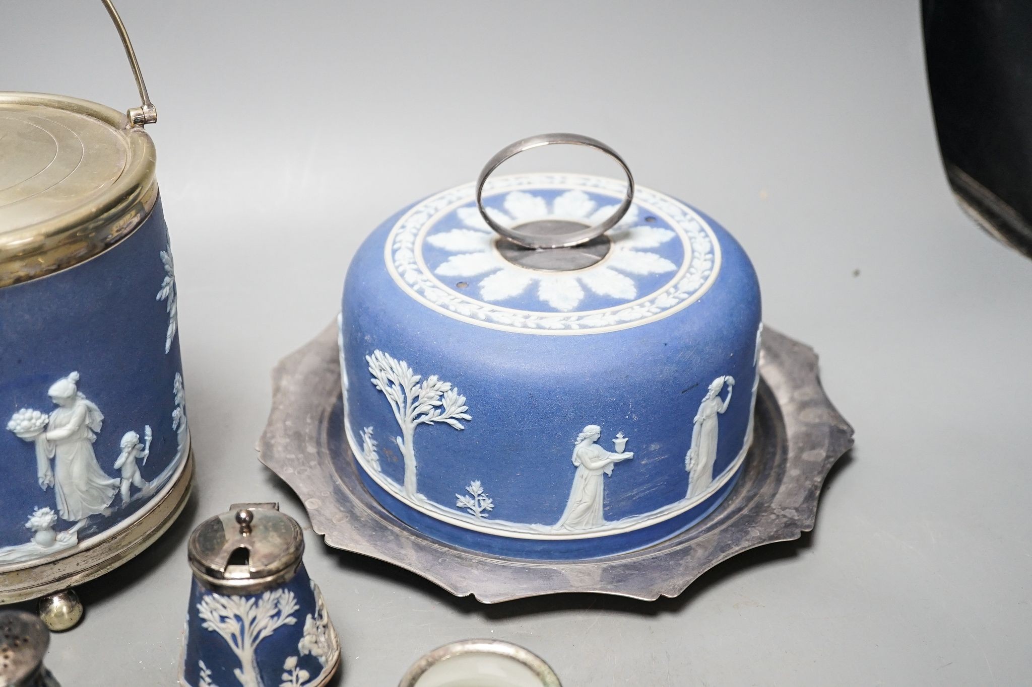 A Victorian Wedgwood blue jasper biscuit barrel and a blue jasper cheese dish cover, with a plated stand , 3 piece condiment set